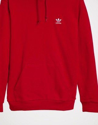 adidas essentials hoodie in red with small logo - ShopStyle